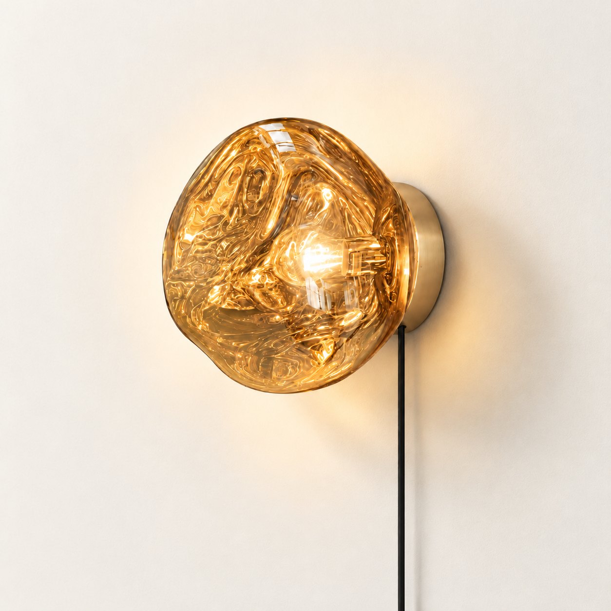 Gold plug-in wall light, shade on